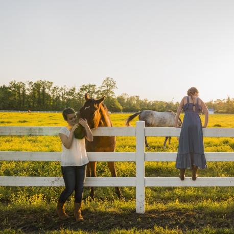 Young women with horses