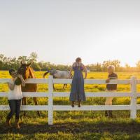 Young women with horses